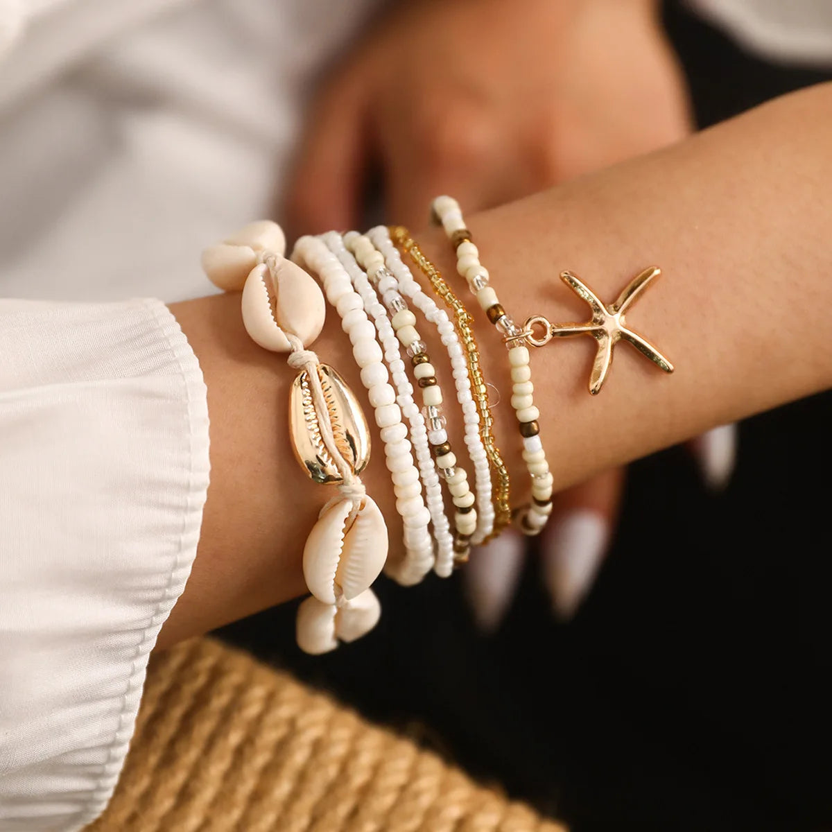 Set de 7 pulseras apilables con estrella de mar – Joyería artesanal de playa con mini cuentas para mujer