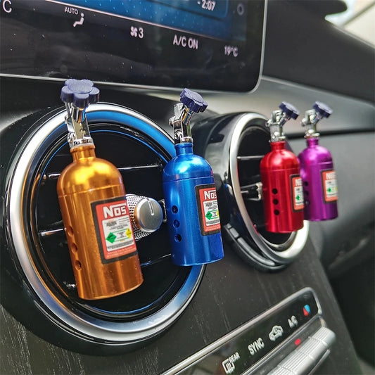 Ambientador de Coche en Forma de Botella NOS | Difusor de Aromaterapia para Rejilla de Aire con Fragancia