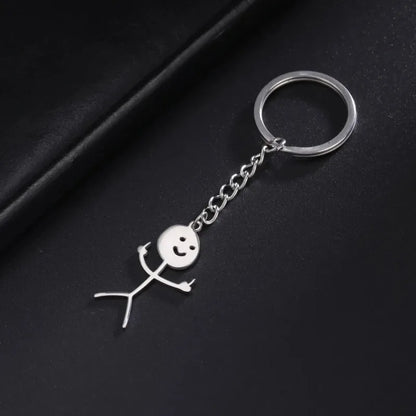 Llavero de Pareja Acero Inoxidable – Diseño Caricatura Graffiti Unisex, Regalo Original para Hombres y Mujeres