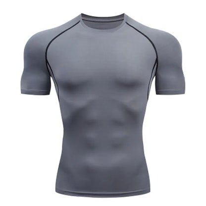 Camiseta Compresiva Hombre – Gym, Fitness, Running y Entrenamiento Outdoor, Manga Corta, Transpirable, Ajuste Elástico, Estilo Bat/Man