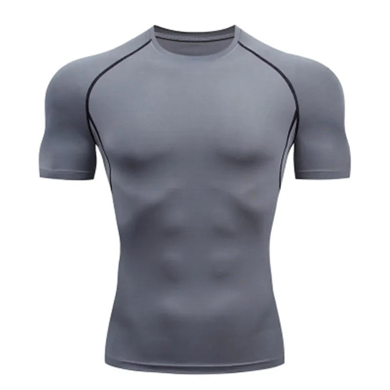Camiseta Compresiva Hombre – Gym, Fitness, Running y Entrenamiento Outdoor, Manga Corta, Transpirable, Ajuste Elástico, Estilo Bat/Man