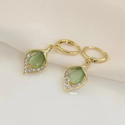 Aretes Coreanos Ojo de Ángel – Aros Dorados con Incrustaciones de Cristales y Diseño Tulipán para Mujer