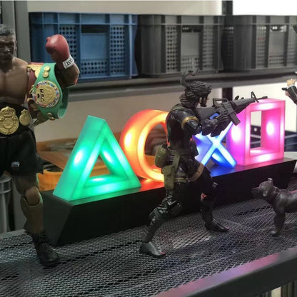 Lámpara Decorativa Icono PS4/PS5 – Lámpara de Mesa Colorida con Control de Sonido – Luz Ambiental Gamer