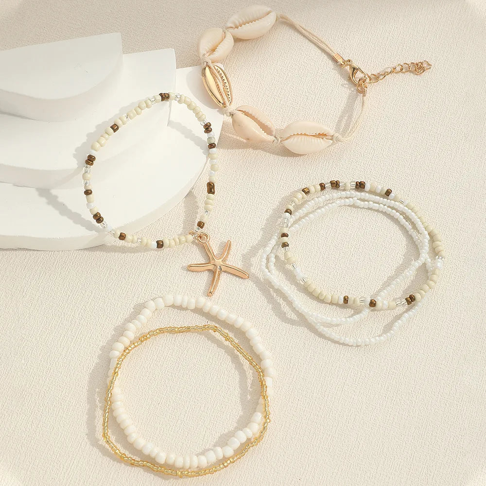 Set de 7 pulseras apilables con estrella de mar – Joyería artesanal de playa con mini cuentas para mujer
