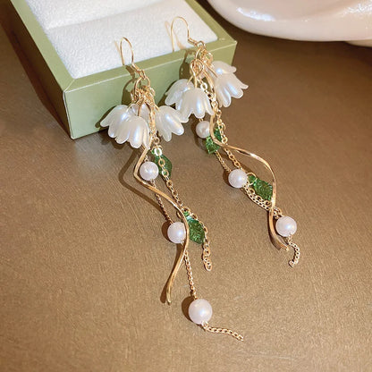 Aretes Coreanos Ojo de Ángel – Aros Dorados con Incrustaciones de Cristales y Diseño Tulipán para Mujer