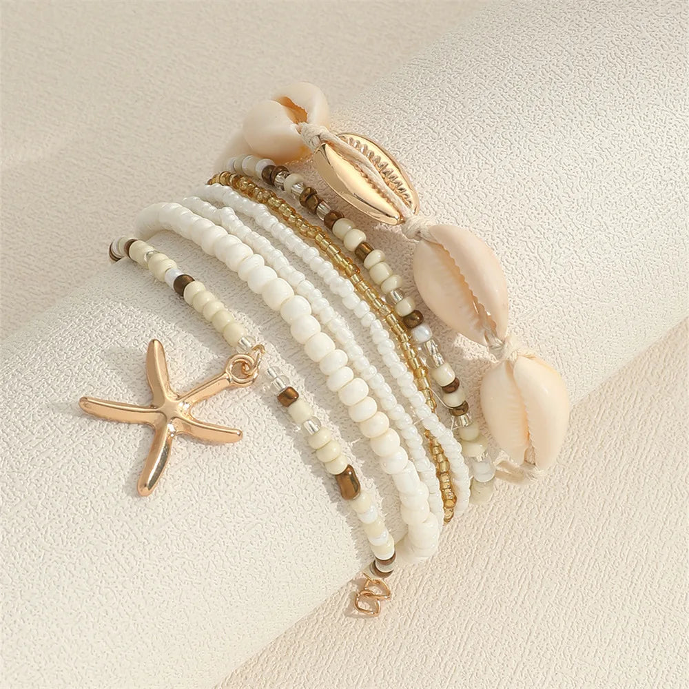 Set de 7 pulseras apilables con estrella de mar – Joyería artesanal de playa con mini cuentas para mujer