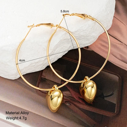 Pendientes Largos con Colgante de Corazón 2024 | Aros Grandes Dorados Estilo Coreano | Joyería de Moda para Mujer