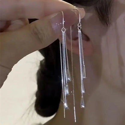 Aretes Coreanos Ojo de Ángel – Aros Dorados con Incrustaciones de Cristales y Diseño Tulipán para Mujer