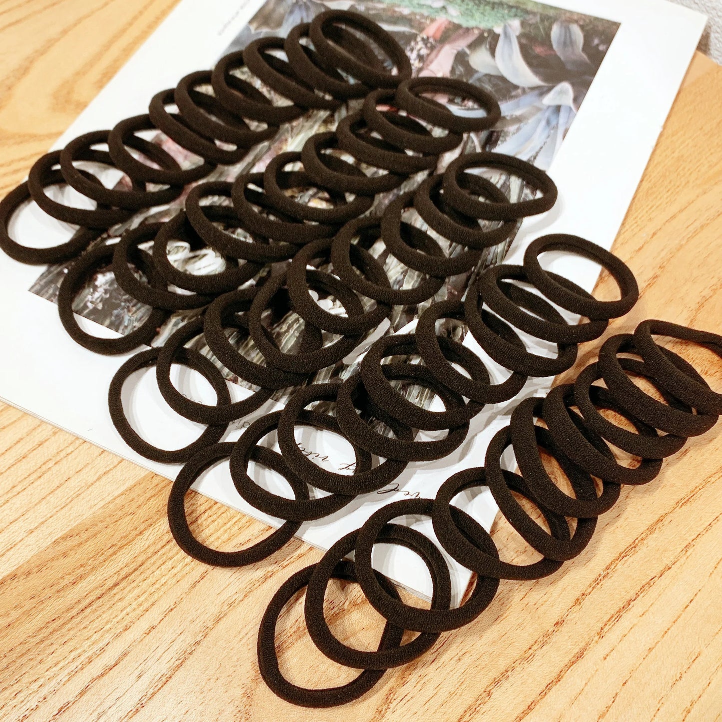 50/100 Piezas Ligas para el Cabello Negras Mujer Niña | Bandas Elásticas Resistentes para Cola de Caballo y Peinados