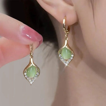 Aretes Coreanos Ojo de Ángel – Aros Dorados con Incrustaciones de Cristales y Diseño Tulipán para Mujer